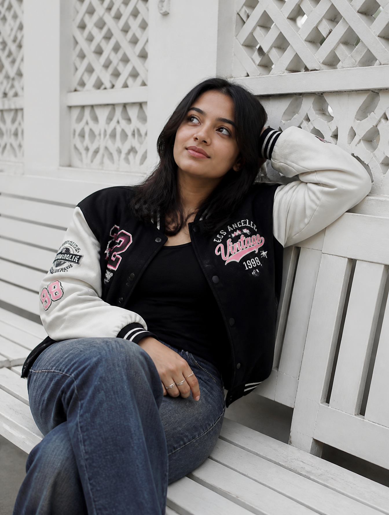 Urban Style Woman on White Lattice Bench