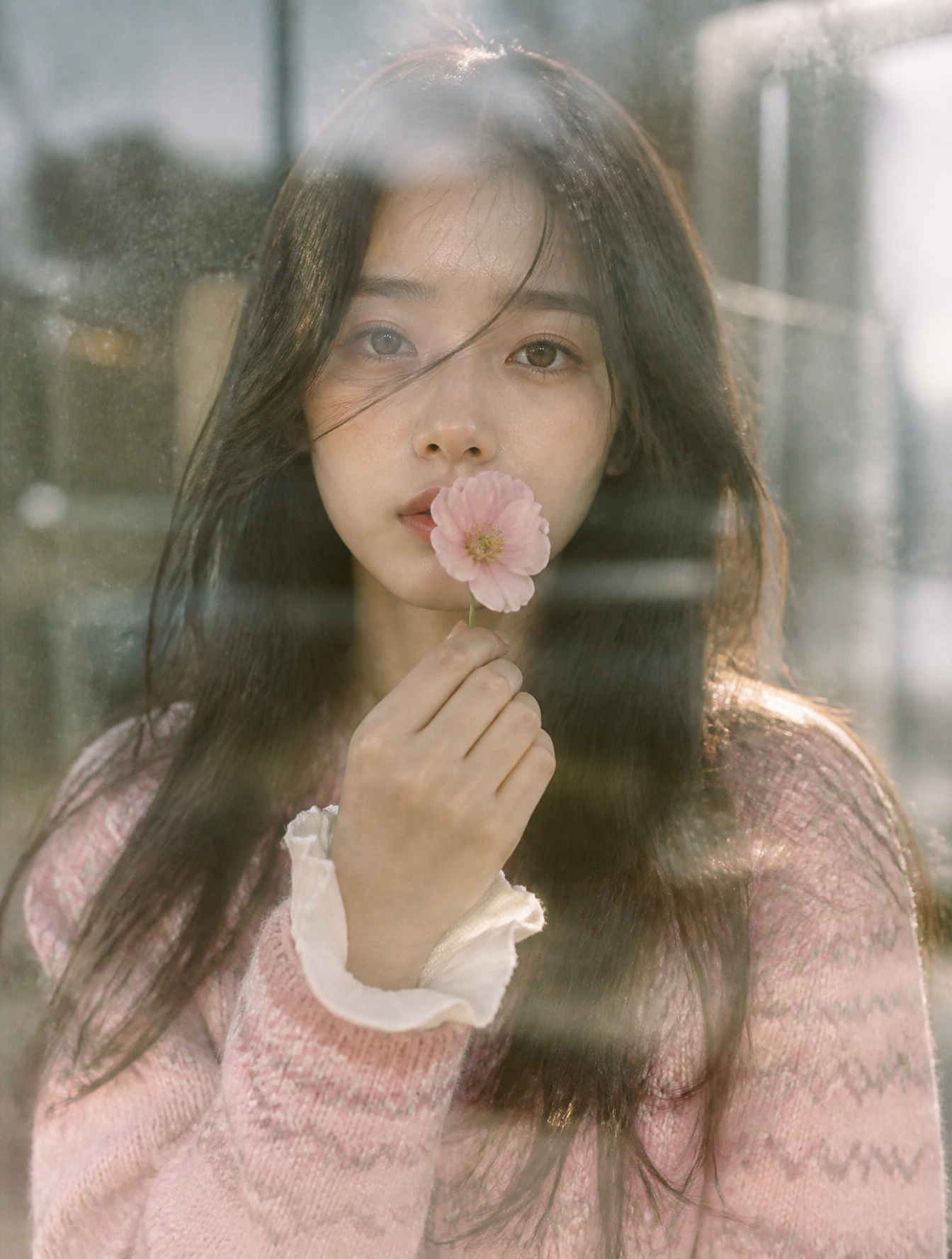 Dreamy Gaze Behind Glass with Pink Flower