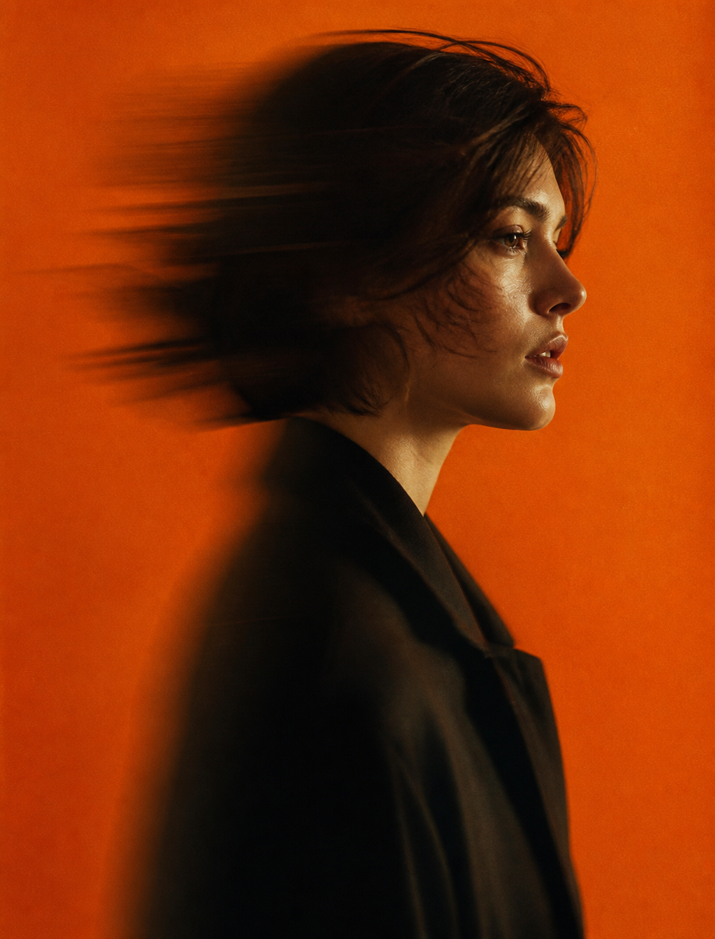 Dynamic Cinematic Portrait in Vivid Orange