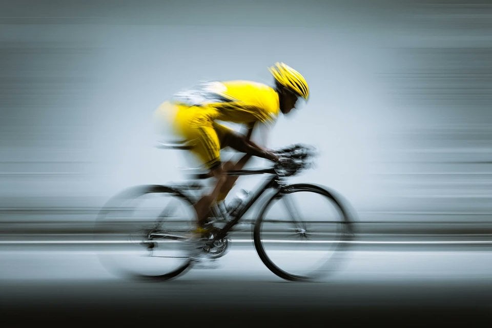 A blurred silhouette of a [Subject] in motion, wearing a ... - alternate