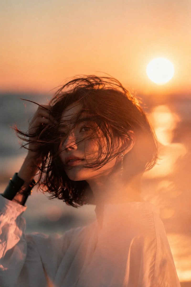 Beautiful young Asian woman at beach sunset, medium shot ...