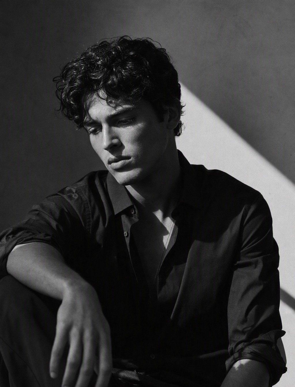 Ultra-realistic cinematic black-and-white editorial portr...