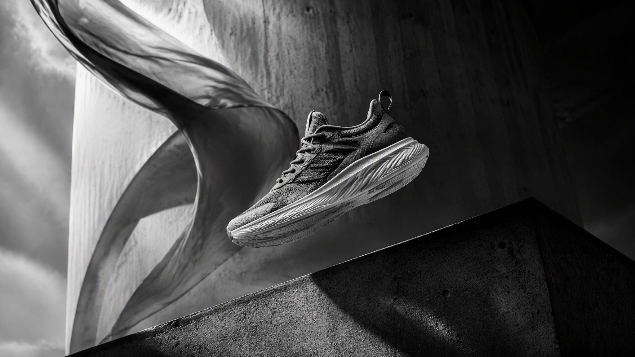 16:9 black-and-white cinematic commercial photograph, pre...