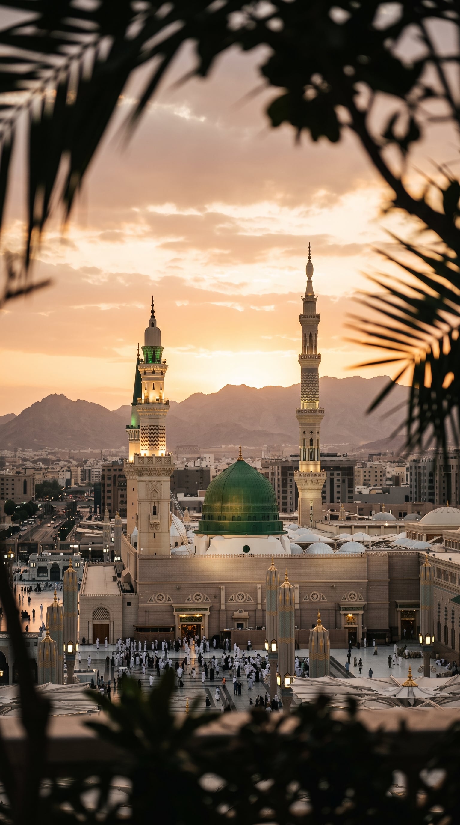 The Prophet’s Mosque in Medina rises above the surroundin...