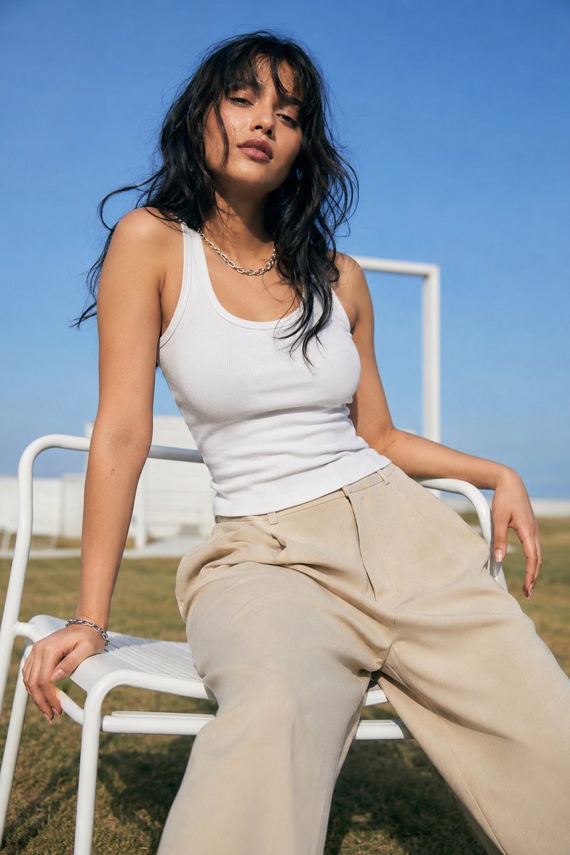 Create an ultra-realistic cinematic editorial fashion pho...