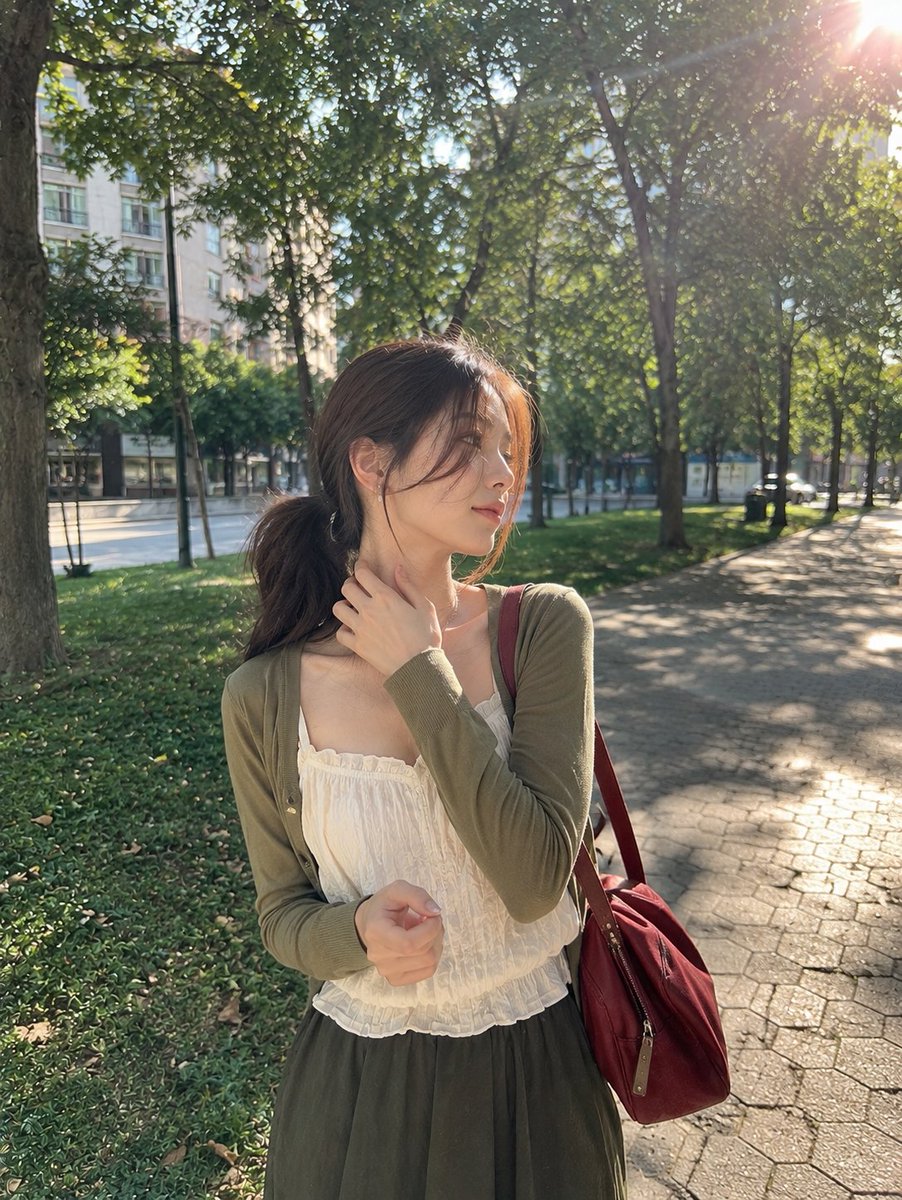 A photorealistic candid outdoor portrait of a young woman...