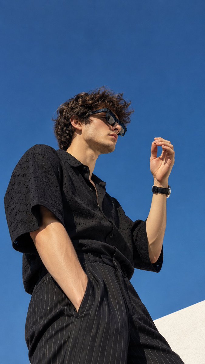 Create an ultra-realistic cinematic fashion editorial pho...