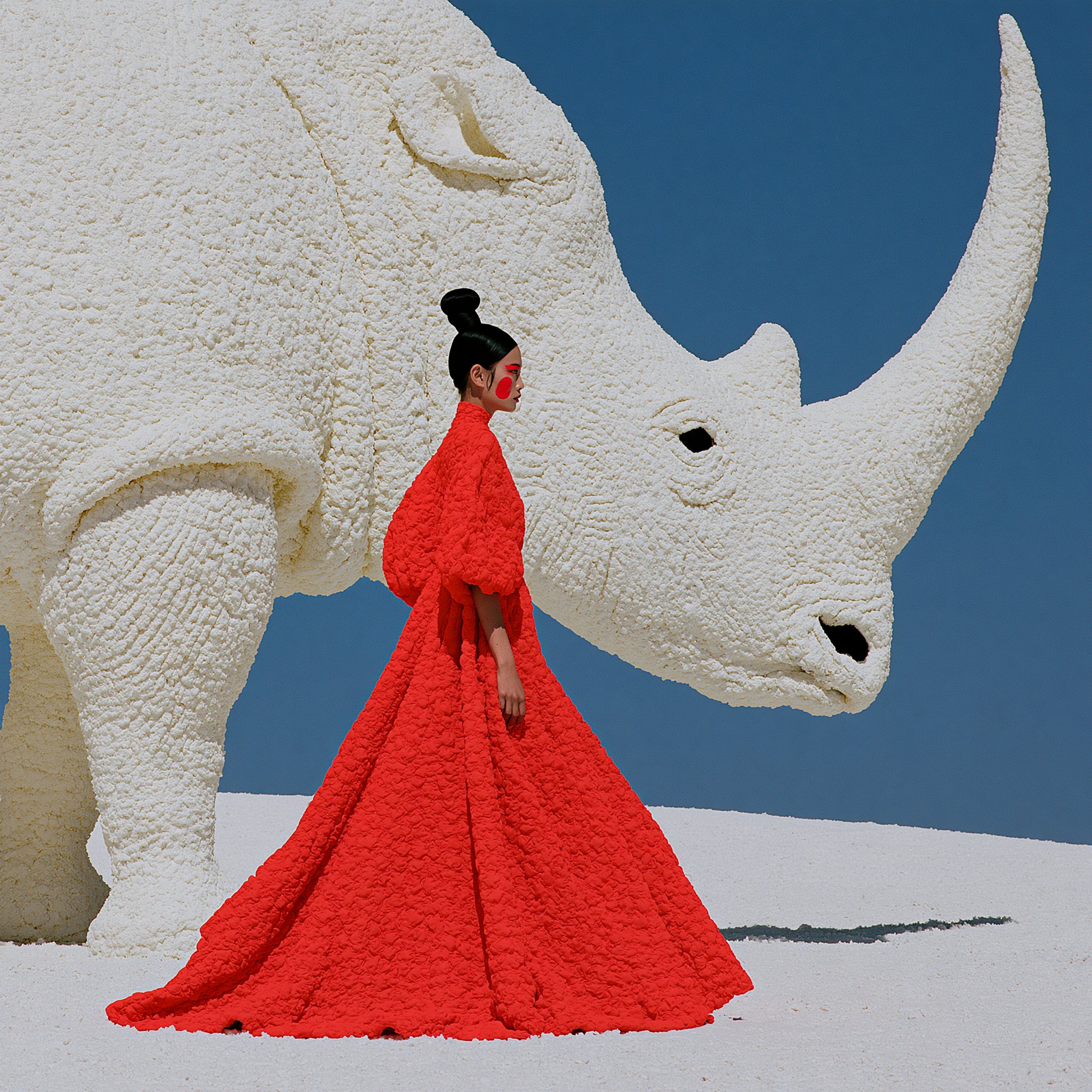 a surreal high-fashion editorial photograph, a colossal w...
