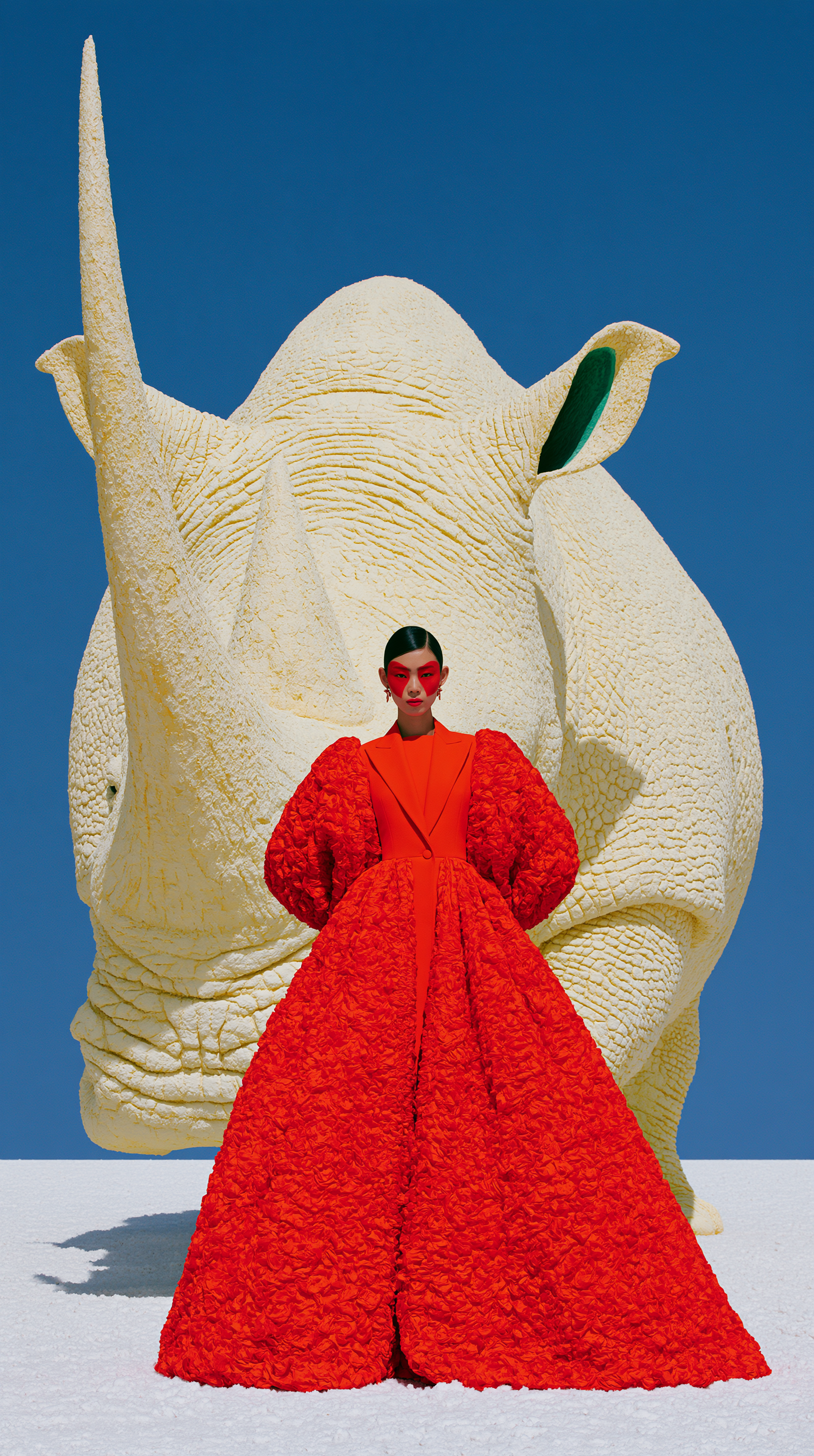 a surreal high-fashion editorial photograph, a colossal w... - alternate