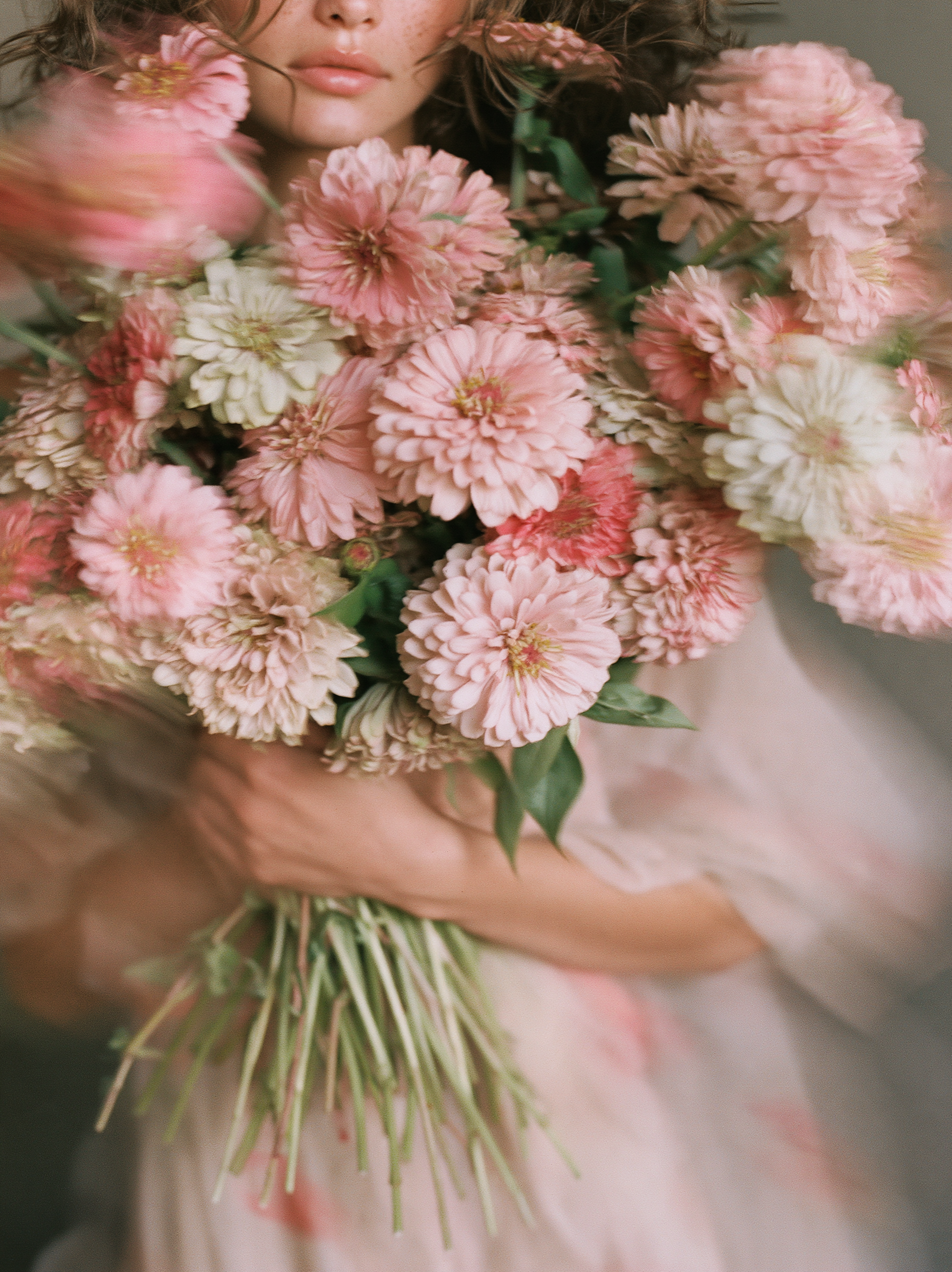 soft fashion photograph of a young woman quietly holding ... - alternate