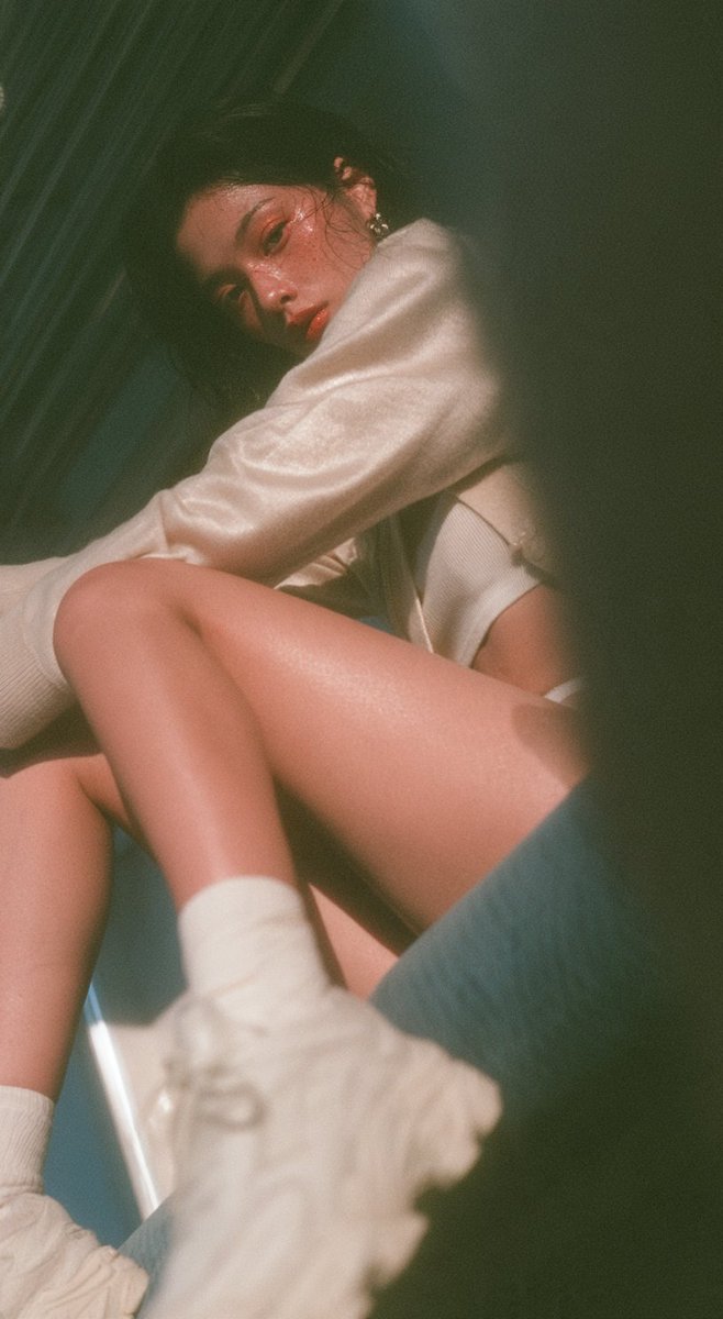 A clearly adult Taiwanese Instagram influencer, fair skin...