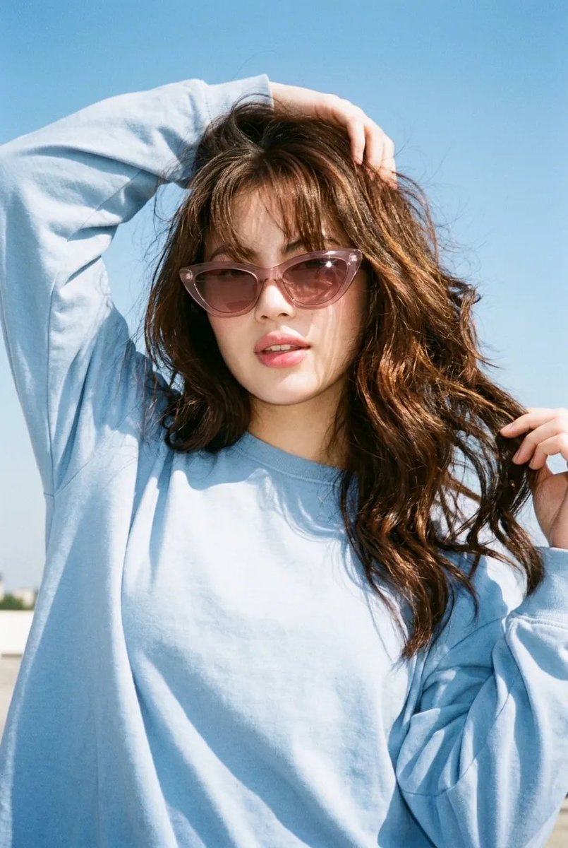 Ultra-realistic vintage Y2K summer fashion portrait of an...