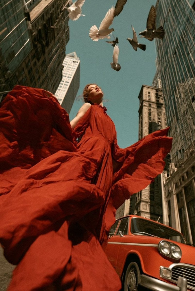 A striking high-fashion editorial photographed from an ex... - alternate