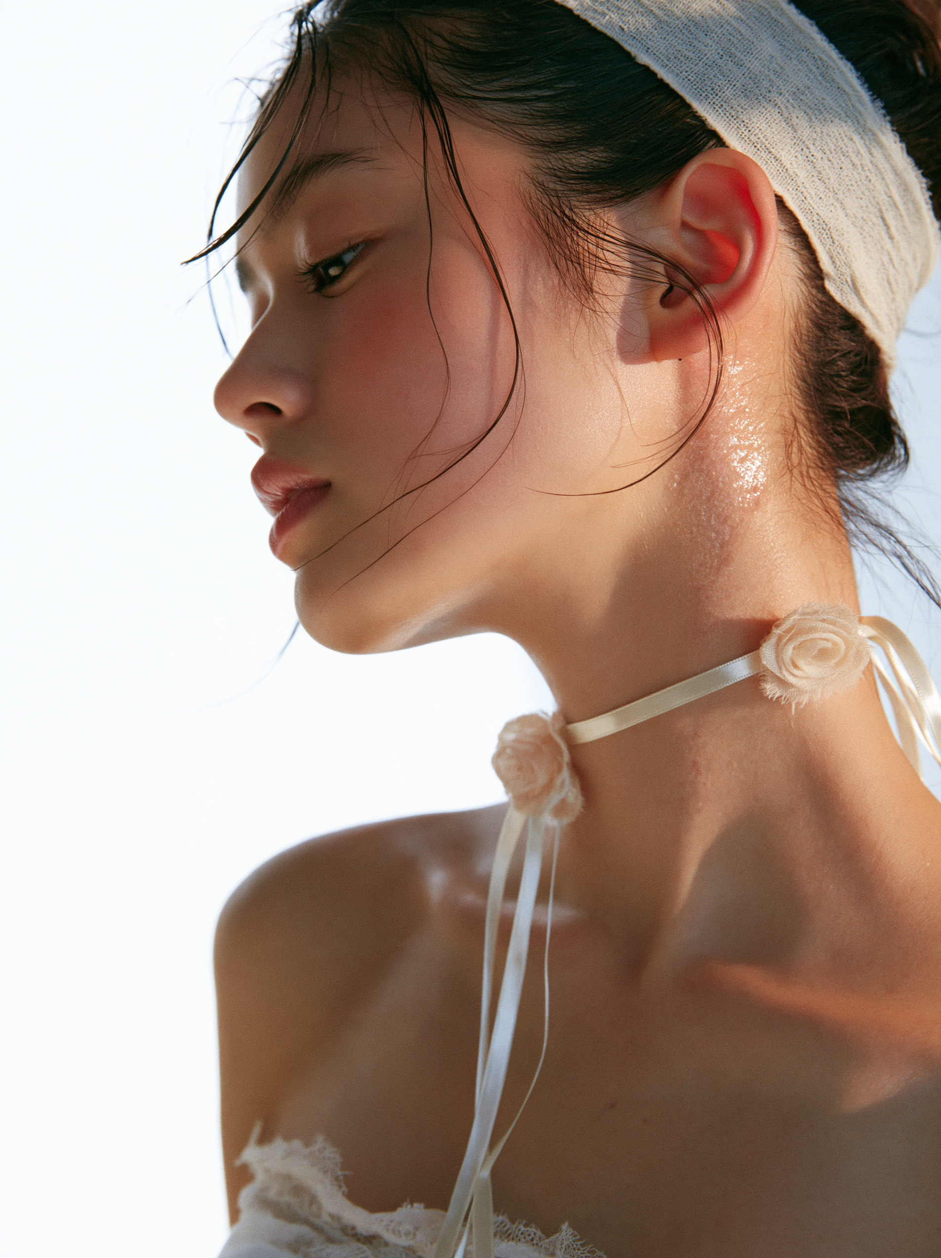 a profile photograph focusing on a young Japanese woman's...